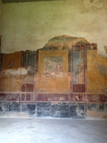 Frescoes on the walls of ancient homes which have been preserved. This one depicts various heroes as well as religious figures